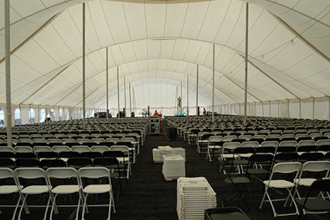 corporate tent rental speaking engagement presentation